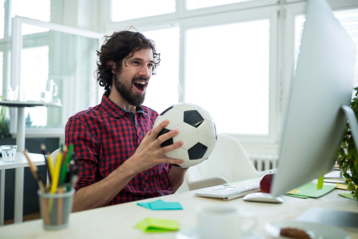 A man watching a football match.